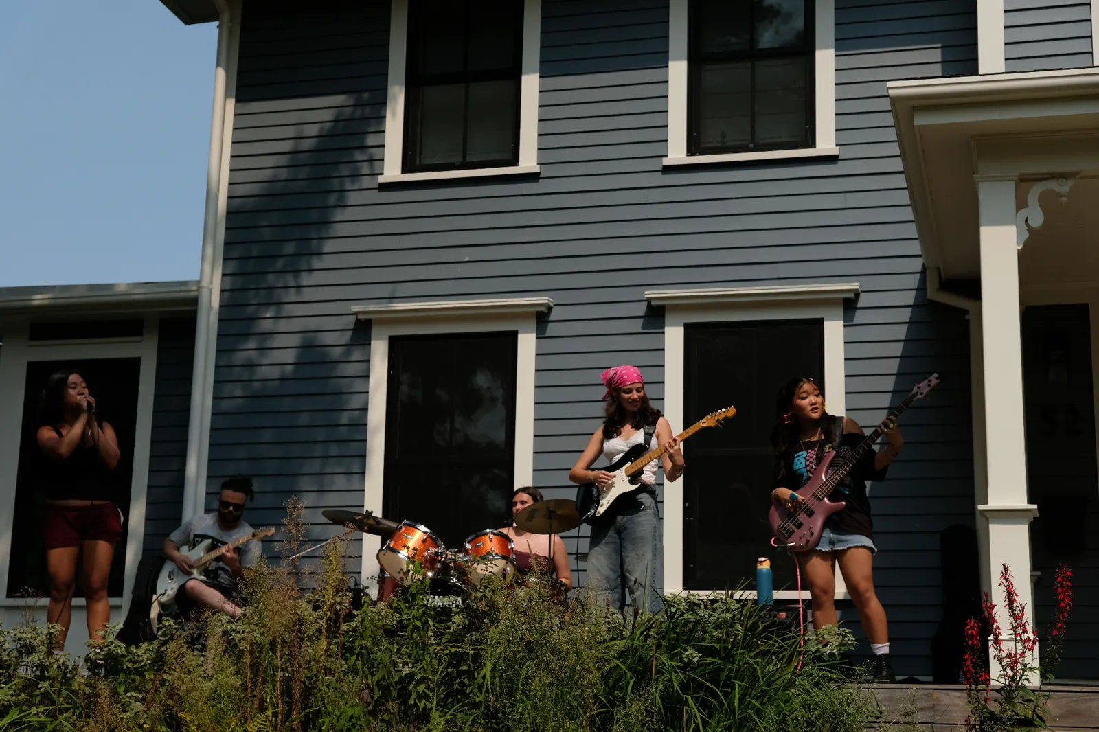 Full band performing live on stage